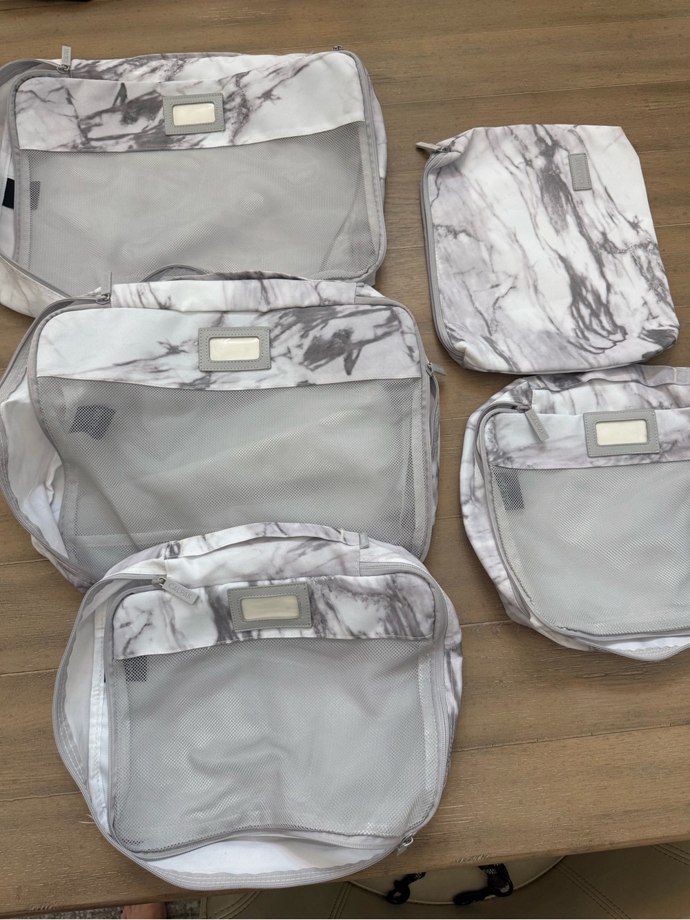 Calpak Marble-Print Travel Packing Cubes in White and Gray